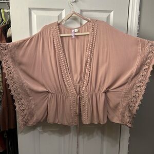 Alya top. Butterfly sleeves. Crotched detailing. Size M.